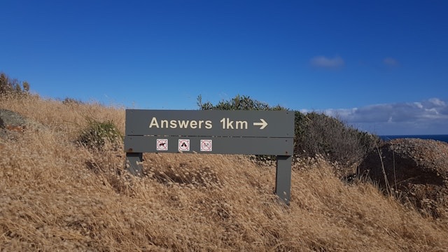 sign-that-says-Answers-1km